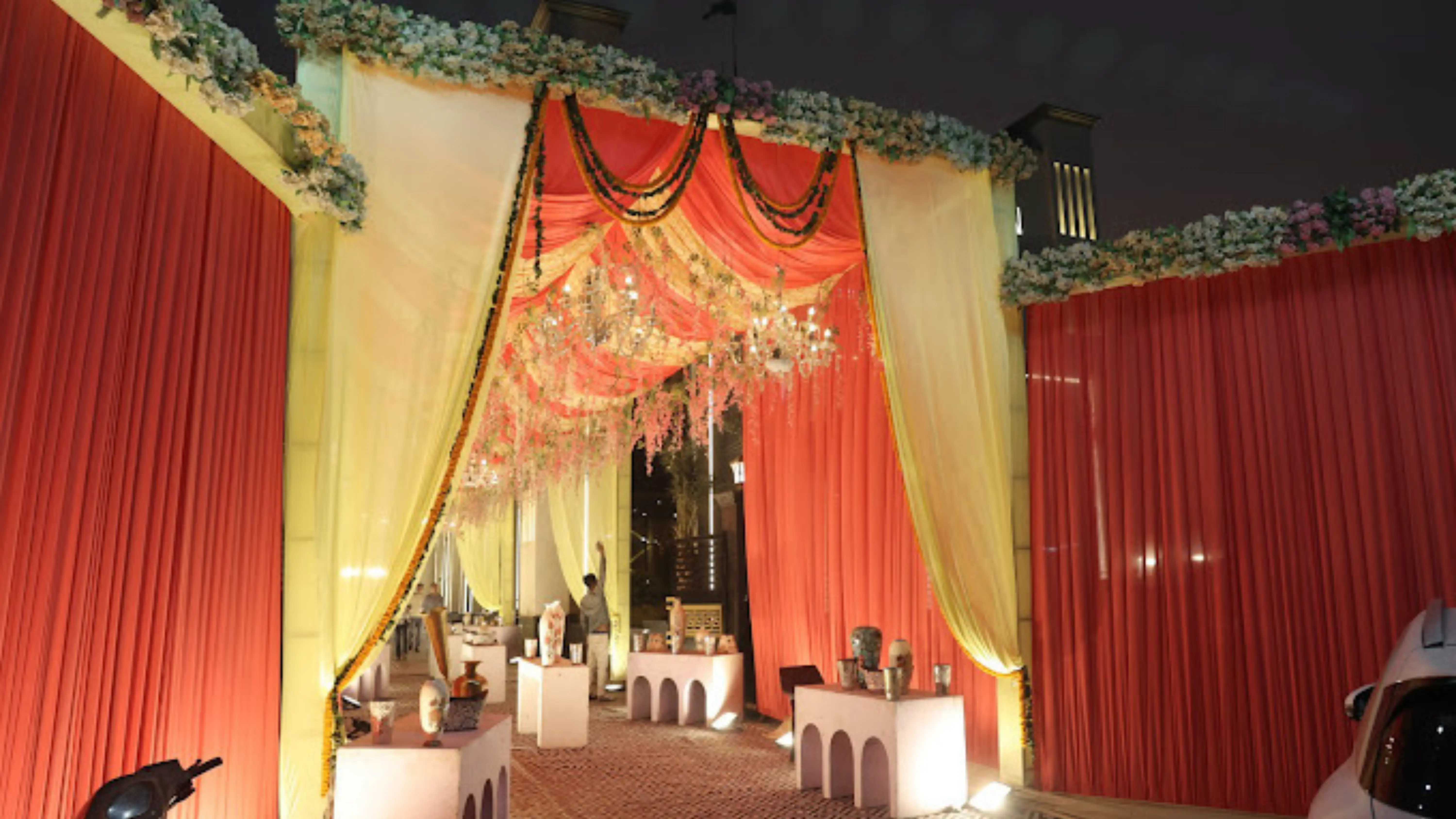 Romantic candlelit dinner setup under the stars